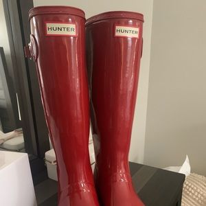 Red glossy hunter boots